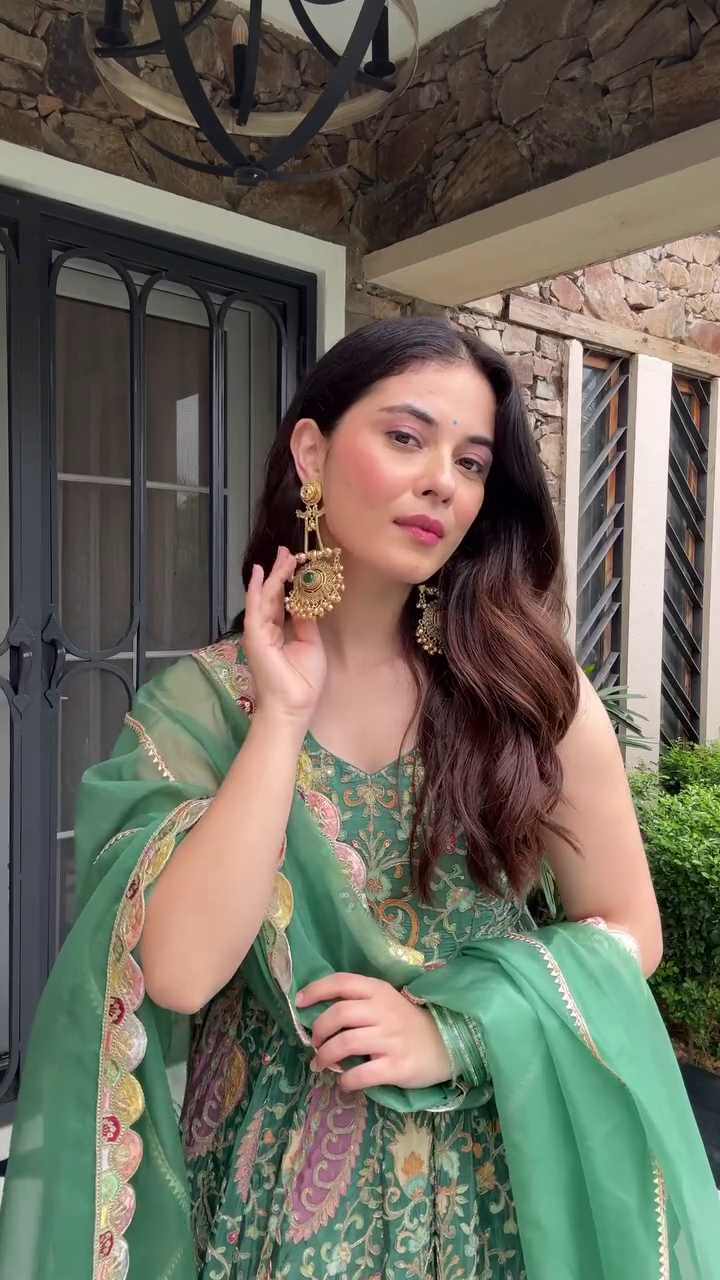 Elegant and Ethereal: Stunning Green Lehenga with Intricate Traditional Embroidery