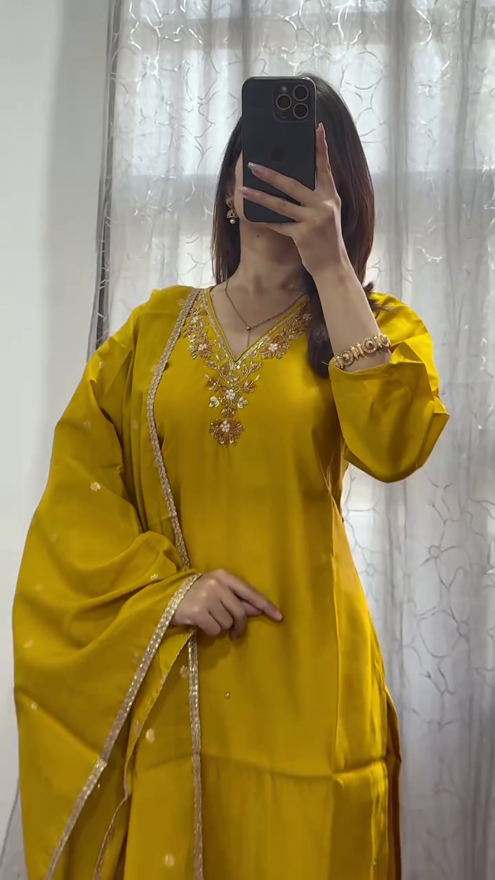 Radiant Golden Elegance: A Majestic Traditional Yellow Ensemble with Intricate Embellishments and Flowing Grace