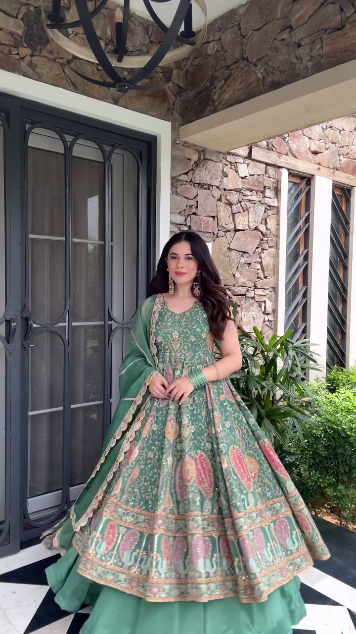 Elegant and Ethereal: Stunning Green Lehenga with Intricate Traditional Embroidery