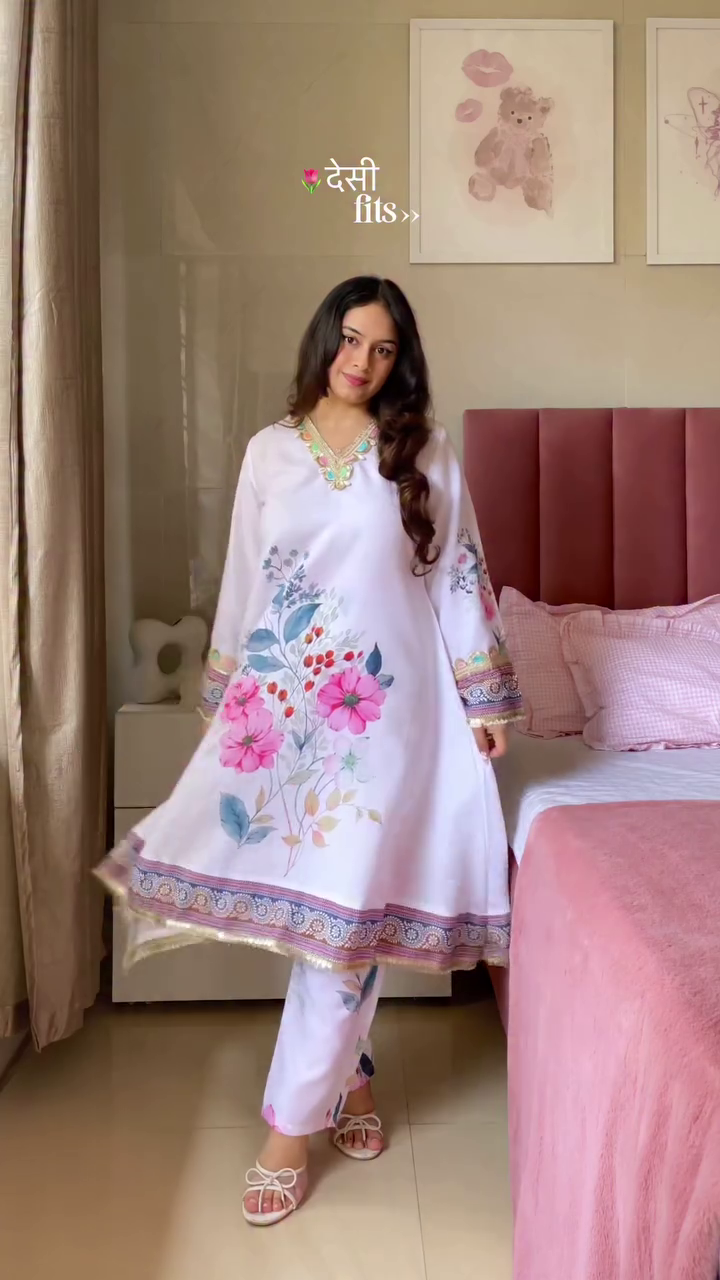 A beautiful collection of ethnic outfits featuring a purple kurta with golden borders and a floral white kurta with vibrant prints