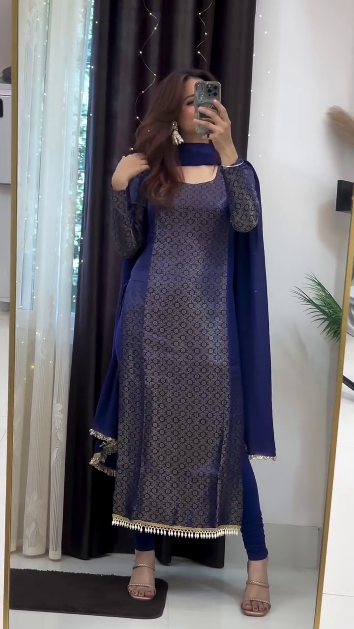 Midnight Elegance: A Royal Blue Traditional Outfit with Gold Accents and Delicate Embellishments