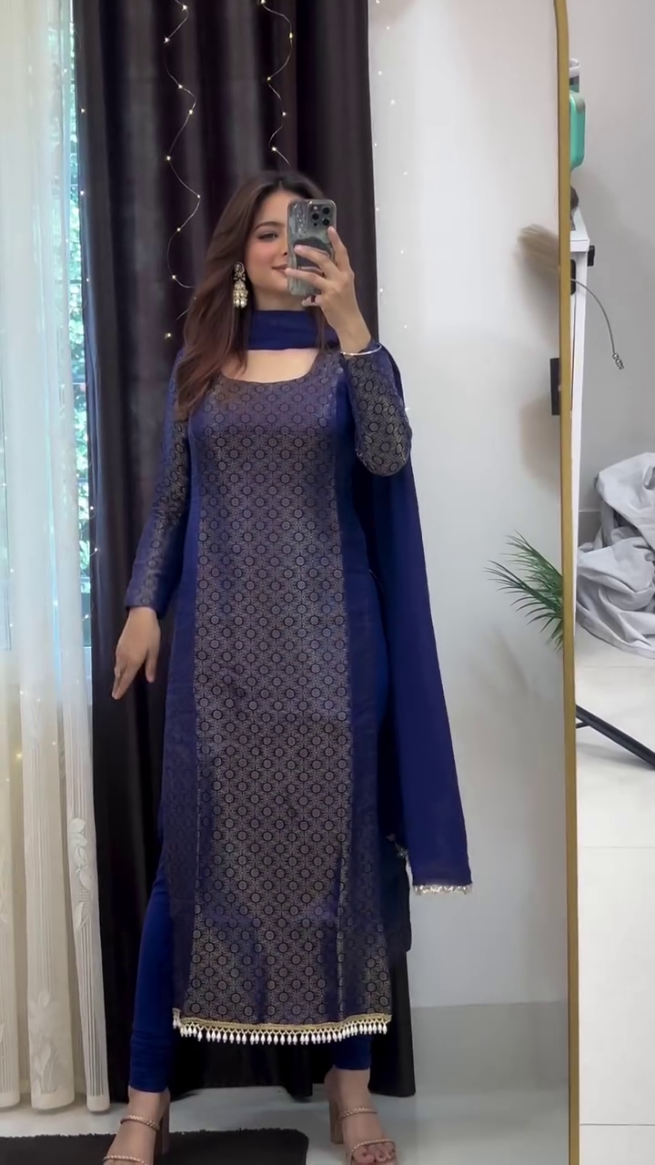Midnight Elegance: A Royal Blue Traditional Outfit with Gold Accents and Delicate Embellishments