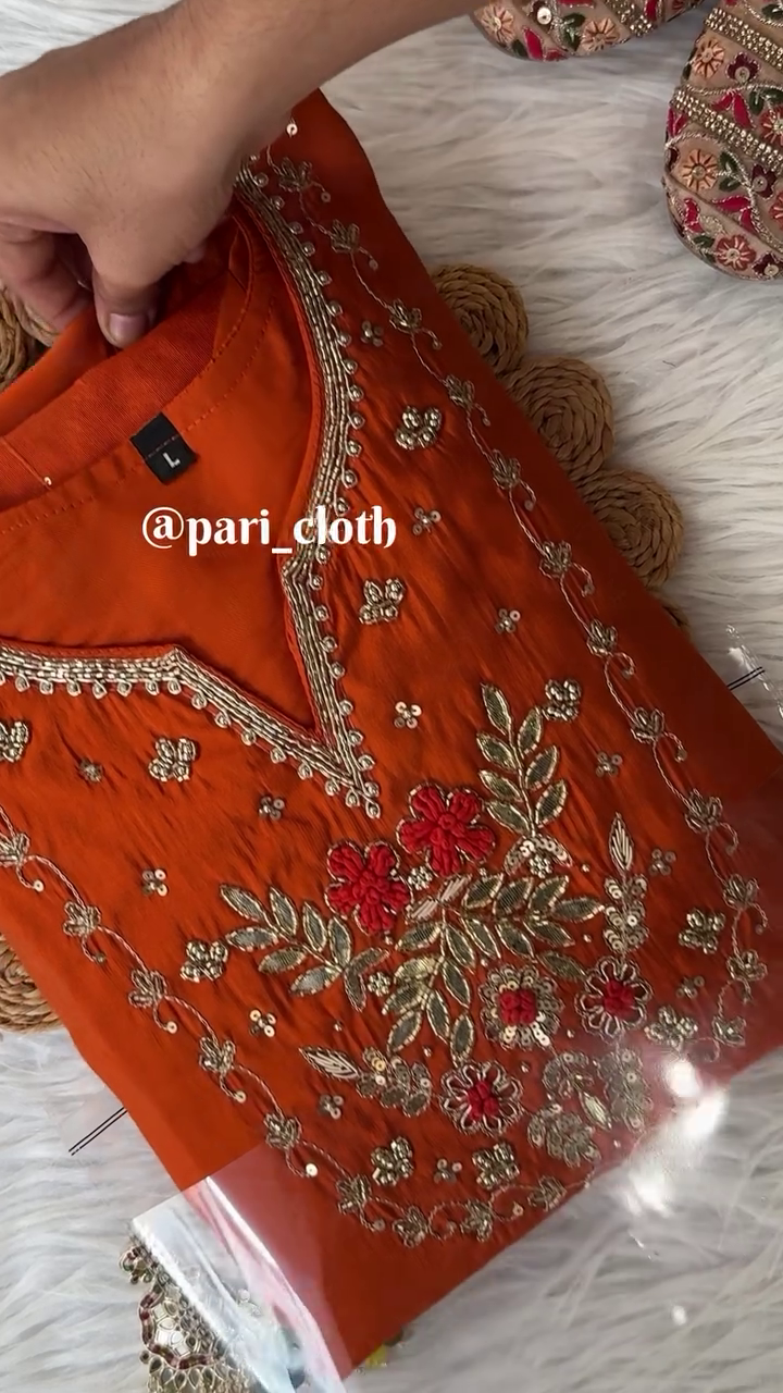 Vibrant Orange Embroidered Kurti with Intricate Floral Thread Work and Beaded Detailing – Perfect for Festive and Traditional Occasions.
