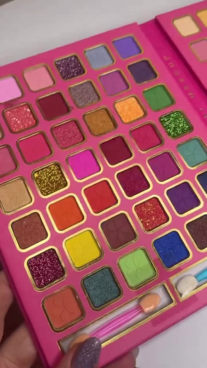 Bold and Vibrant Eyeshadow Palette Featuring a Wide Range of Rich Matte and Glittery Shades in Bright and Dazzling Colors for Creative Makeup Looks