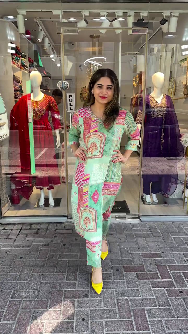 Vibrant Mint Green Kurta Set with Multicolor Traditional Print, Mirror Work on Neckline, and Coordinated Printed Pants – A Refreshing and Artistic Ethnic Outfit Perfect for Day Events and Summer Festivities