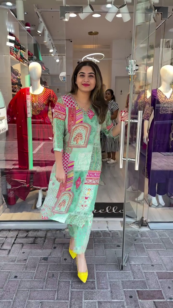 Vibrant Mint Green Kurta Set with Multicolor Traditional Print, Mirror Work on Neckline, and Coordinated Printed Pants – A Refreshing and Artistic Ethnic Outfit Perfect for Day Events and Summer Festivities