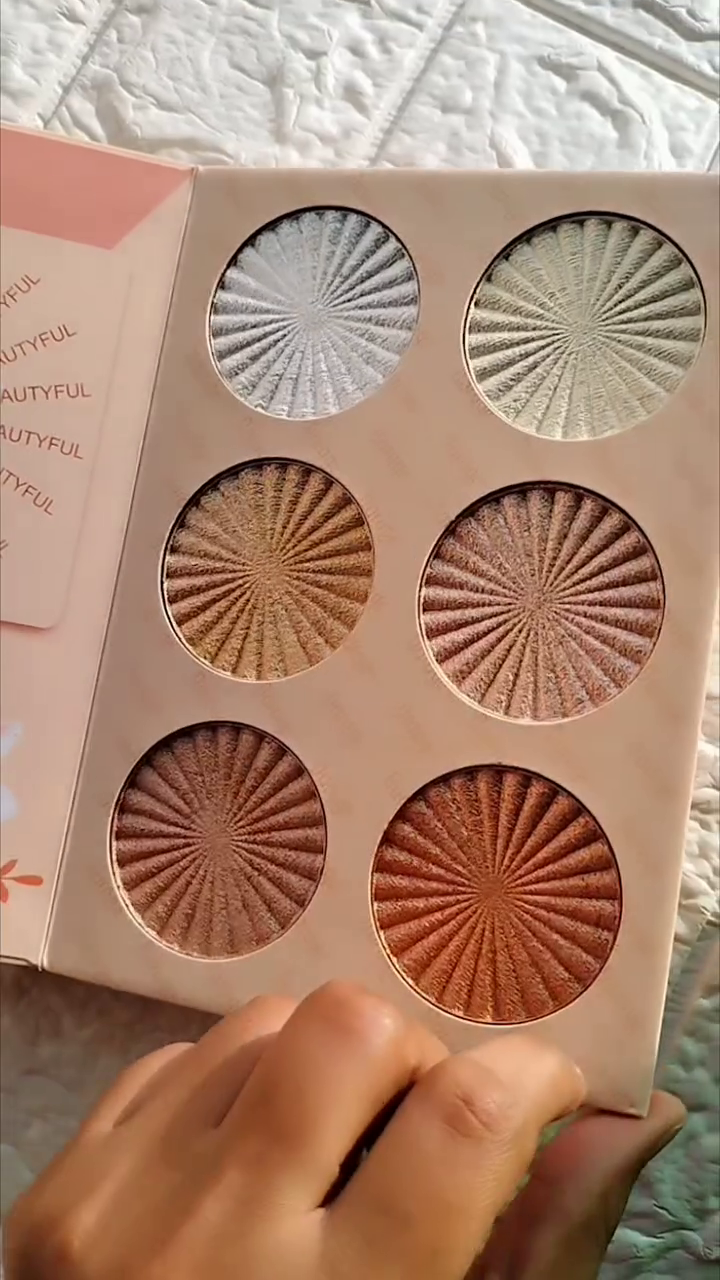 24-Color Matte and Shimmer Eyeshadow Palette with Bold Reds, Pinks, Oranges, and Neutrals for Vibrant and Glamorous Eye Looks