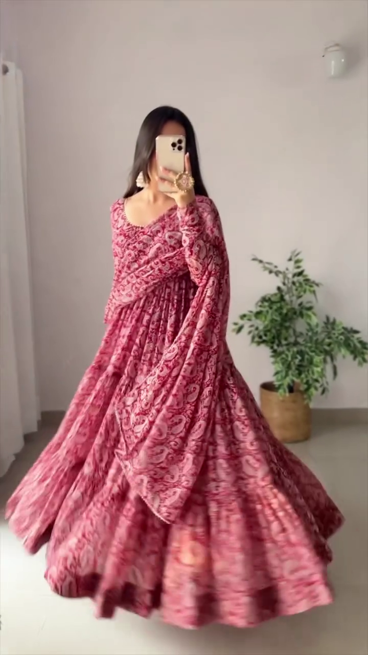 Beautiful Pink Floral Printed Anarkali Dress with Flowing Skirt and Dramatic Sleeves for a Traditional and Elegant Look