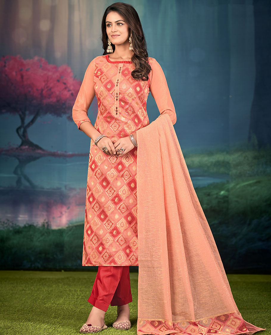 Peach churidar material set, diamond patterned and mirror embroidered top, contrast plain bottom, and geometric patterned dupatta