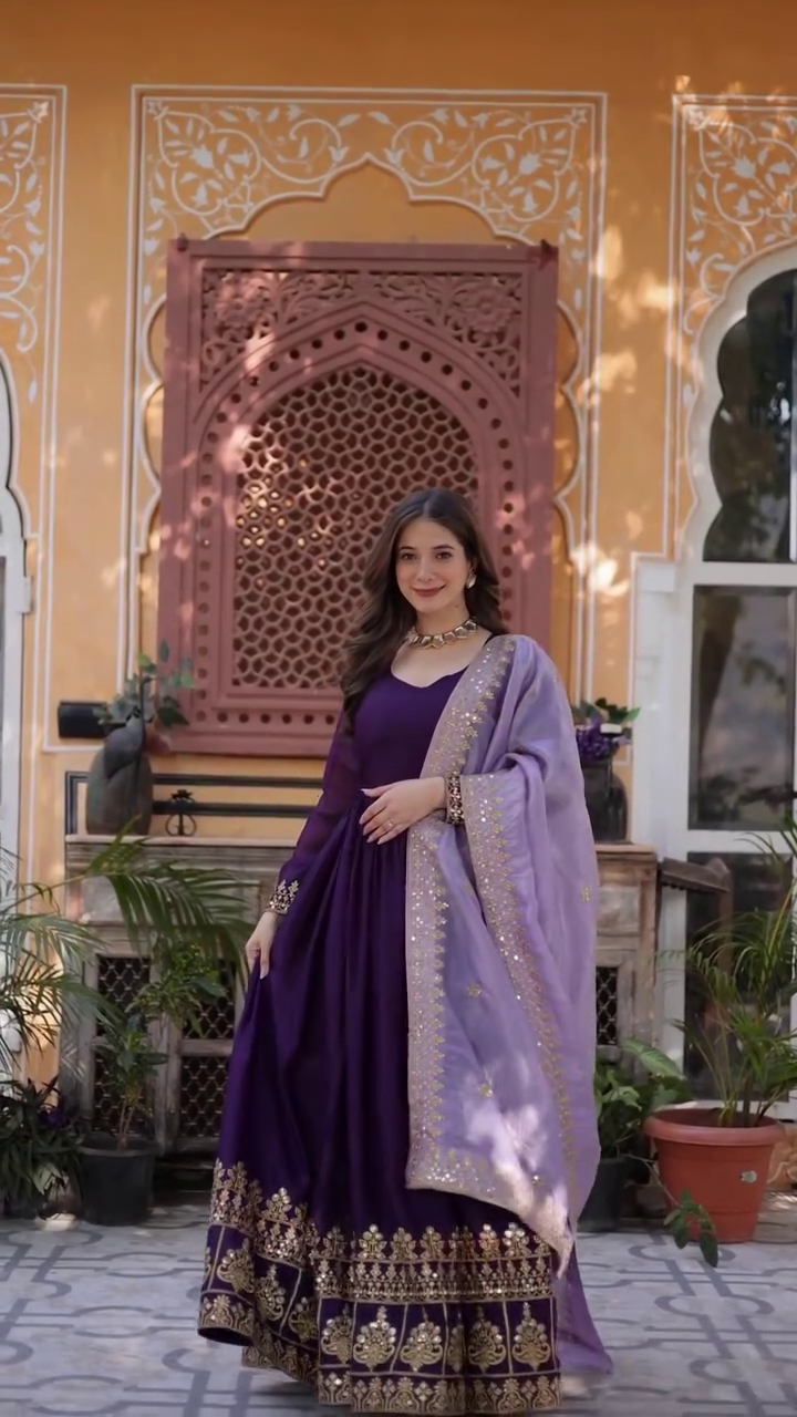 Regal Charm: Purple Anarkali with Lavish Gold Embroidery for a Timeless Festive Look