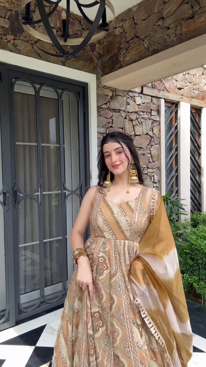 Majestic Beige and Gold Anarkali Gown with Intricate Embroidery and a Flowing Dupatta, Perfect for Formal and Festive Occasions