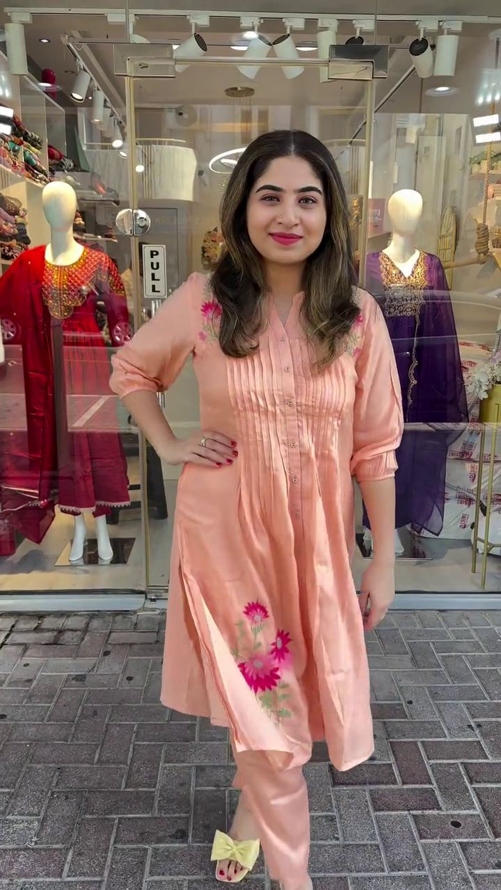 Peach Cotton Kurta Set Featuring Delicate Thread Embroidery with Front Pintuck Detailing, Paired with Matching Straight Pants – A Breezy and Elegant Choice for Everyday Ethnic Wear and Minimal Festive Looks