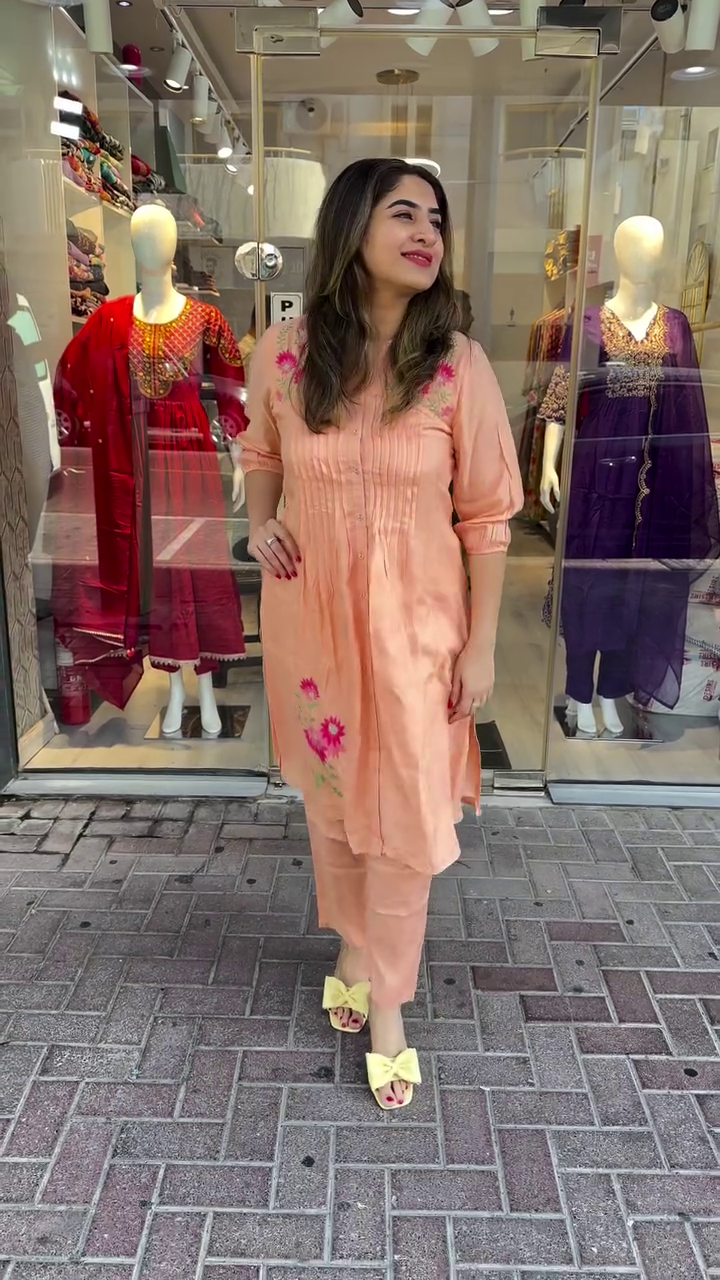 Peach Cotton Kurta Set Featuring Delicate Thread Embroidery with Front Pintuck Detailing, Paired with Matching Straight Pants – A Breezy and Elegant Choice for Everyday Ethnic Wear and Minimal Festive Looks