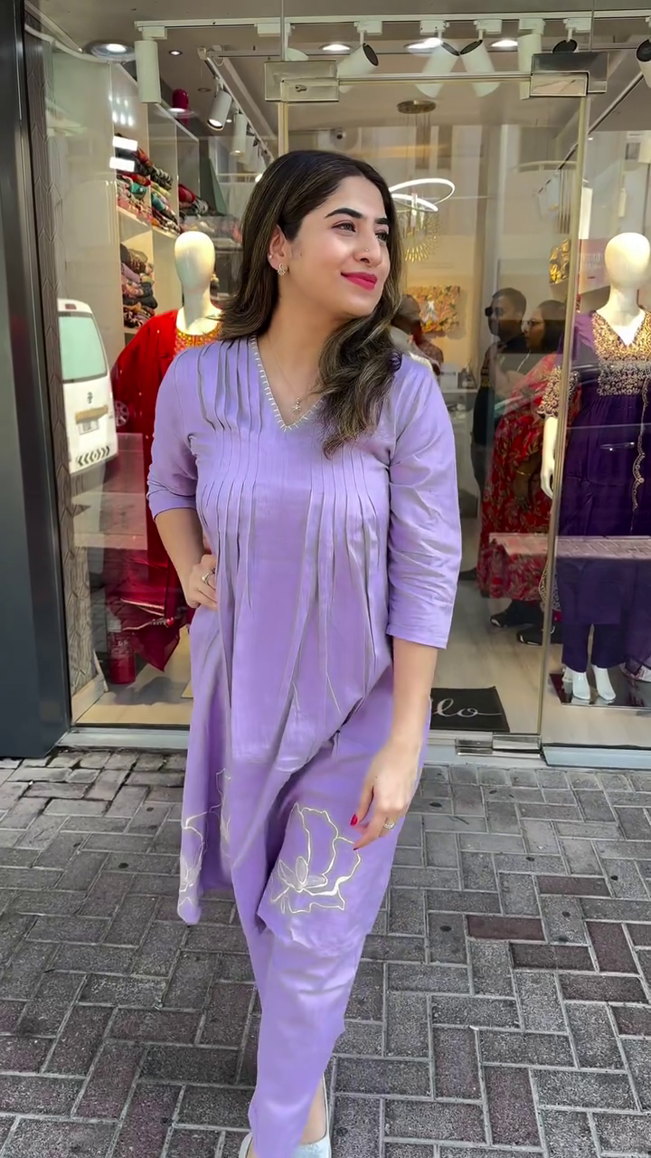 Graceful Lavender Cotton Kurta Set Featuring Elegant Pintuck Front Detailing and Delicate Floral Embroidery on Hem, Paired with Matching Straight Pants – A Soft and Sophisticated Look for Daily Elegance and Light Festive Wear