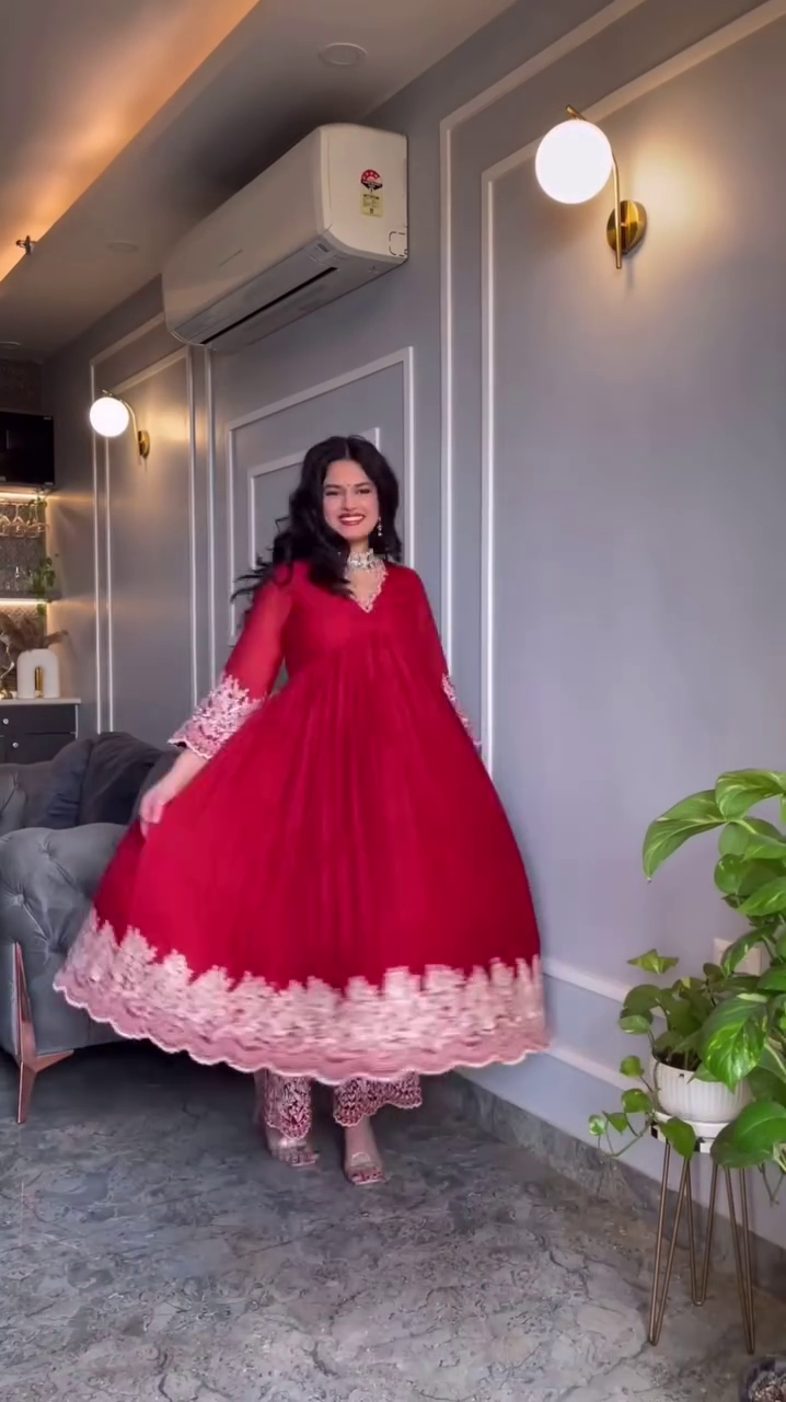 Elegant Red Anarkali Gown with Intricate Embroidery and Flared Hem, Perfect for Festive and Special Occasions