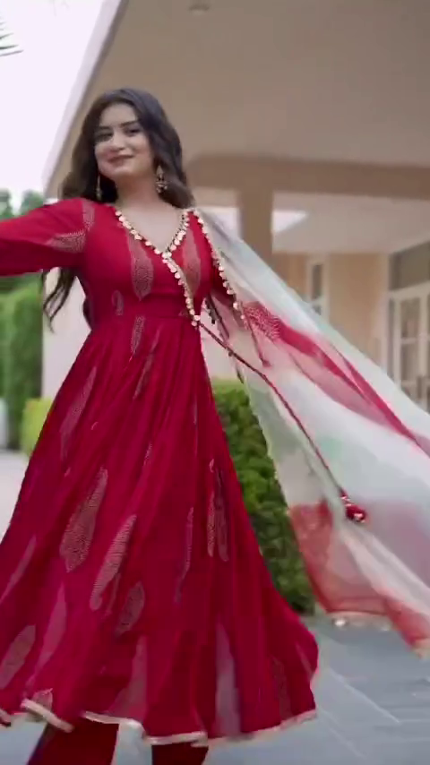 Red Anarkali Dress with Intricate Embroidery and a Flowy Silken Dupatta, Perfectly Complemented by Pearl Detailing, Ideal for Festive Celebrations and Special Occasions