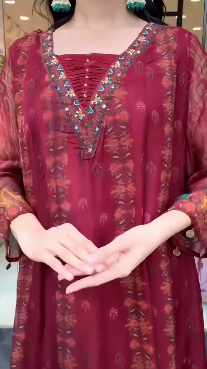 Maroon Kurta Set with Intricate Traditional Prints and Embroidery, Paired with a Flowing Dupatta and Stylish Churidar for a Chic, Festive Look