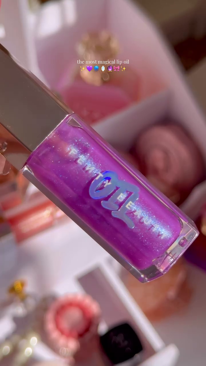 The Most Magical Lip Oil with a Beautiful Purple Hue and Sparkling Finish, Perfect for Adding a Glossy, Hydrated Shine to Your Lips
