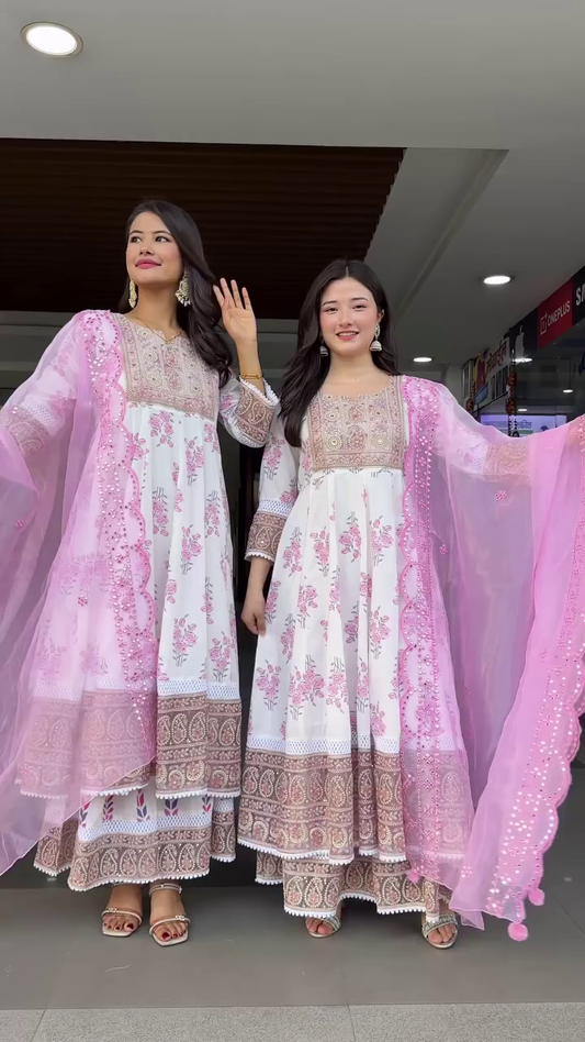 White and Pink Floral Printed Anarkali Set with Heavy Embroidered Yoke, Paisley Border Detailing, Net Dupatta with Scalloped Edges and Bead Work – Traditional Indian Ethnic Wear for Women