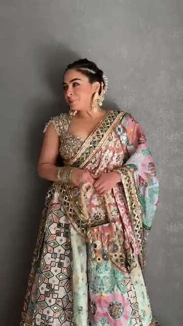 Opulent Multi-Colored Mirror Work Lehenga Set with Intricate Foil Detailing, Pastel Floral Prints, and Heavy Embroidered Dupatta – A Grand Statement for Weddings & Sangeet Nights