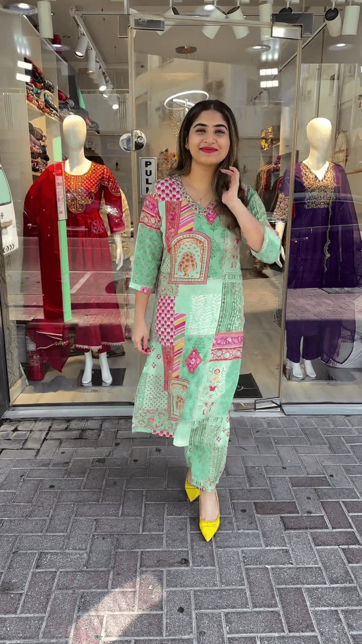 Vibrant Green Printed Kurti with Patchwork Design and V-neck for a Stylish, Modern Look