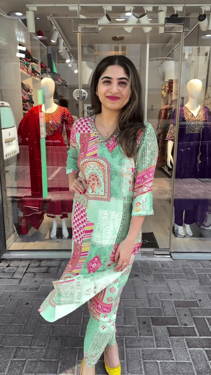 Vibrant Green Printed Kurti with Patchwork Design and V-neck for a Stylish, Modern Look