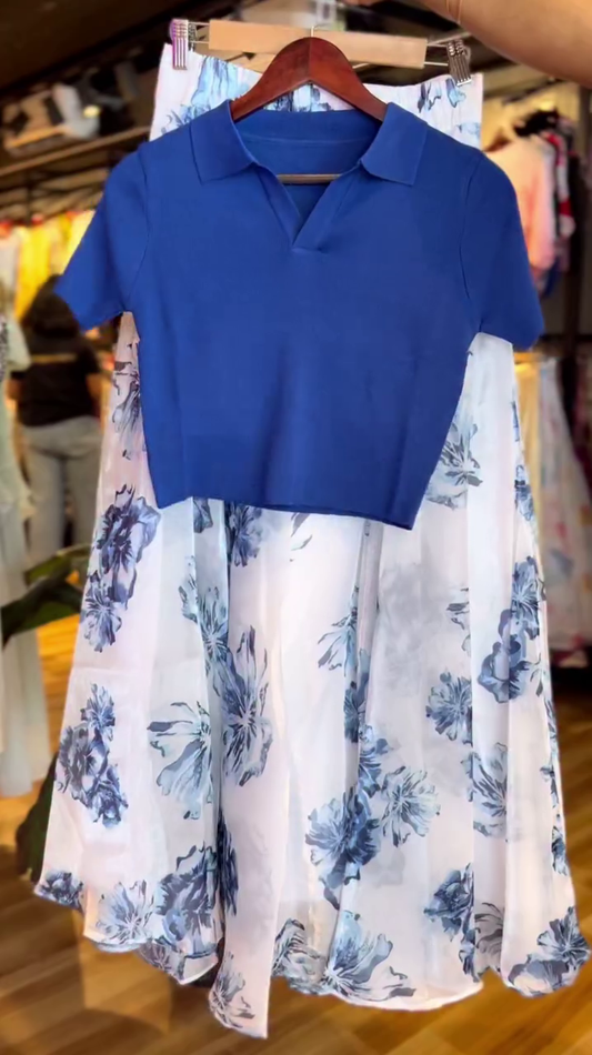 Trendy Blue Polo-Neck Crop Top with Stylish White Flared Skirt Featuring Bold Blue Floral Prints, Perfect Summer Co-Ord Set for Casual Outings, Brunch Dates, and Daytime Events